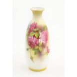 A Royal Worcester vase with floral decoration. Signed Ethel Spilsbury. Marked under. Approx. 5 1/