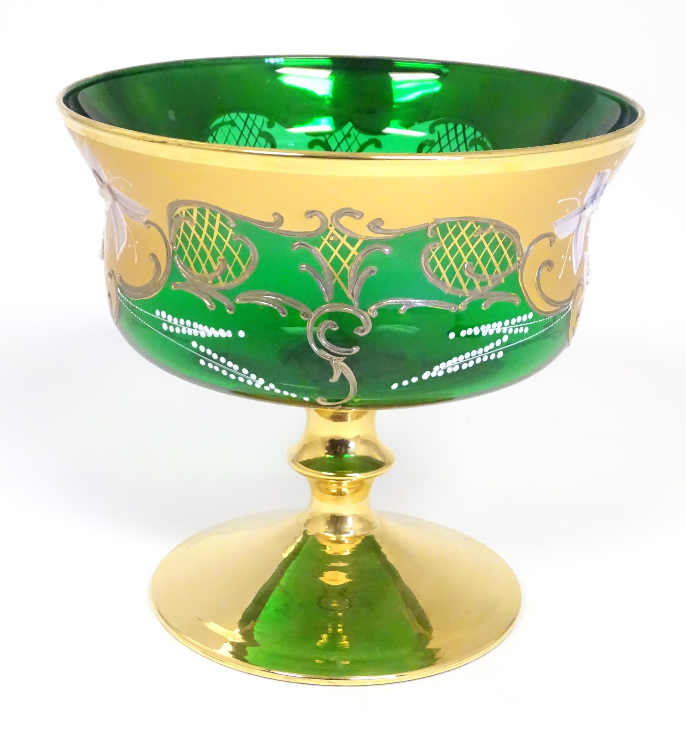 A Bohemian green glass pedestal bowl with gilt and enamel floral detail. Approx. 7" high x 7 1/2" - Image 3 of 8