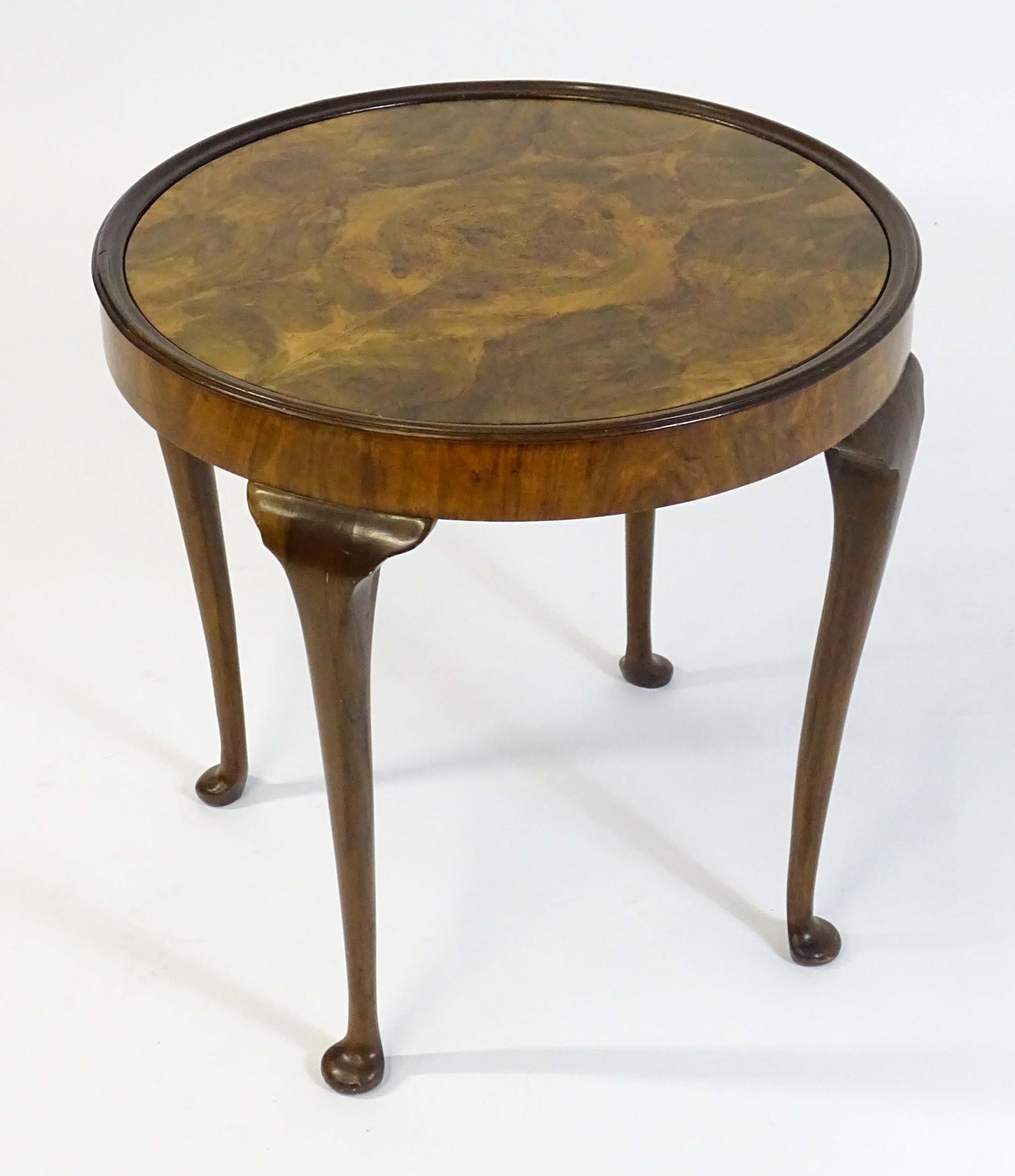 An early / mid 20thC walnut occasional / games table with a reversible top above four cabriole - Image 3 of 8