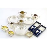 Assorted silver plated wares to include a scallop shell formed butter dish, two cased christening