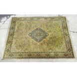 Carpet / rug : A Louis De Poortere carpet with central rosette medallion bordered by floral and
