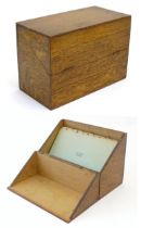 A 20thC oak correspondence / address box. Approx. 6" high x 8 3/4" wide x 4 1/2" deep Please