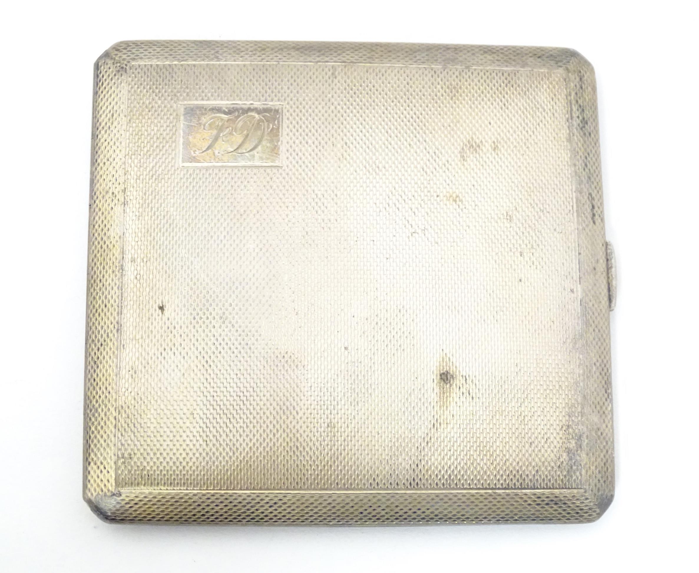 A silver cigarette case with engine turned decoration and gilded interior, hallmarked Birmingham - Image 5 of 10