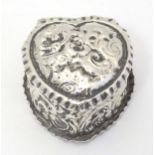 A Victorian silver pill box of heart shape hallmarked Birmingham 1892. 1 1/2" long Please Note -