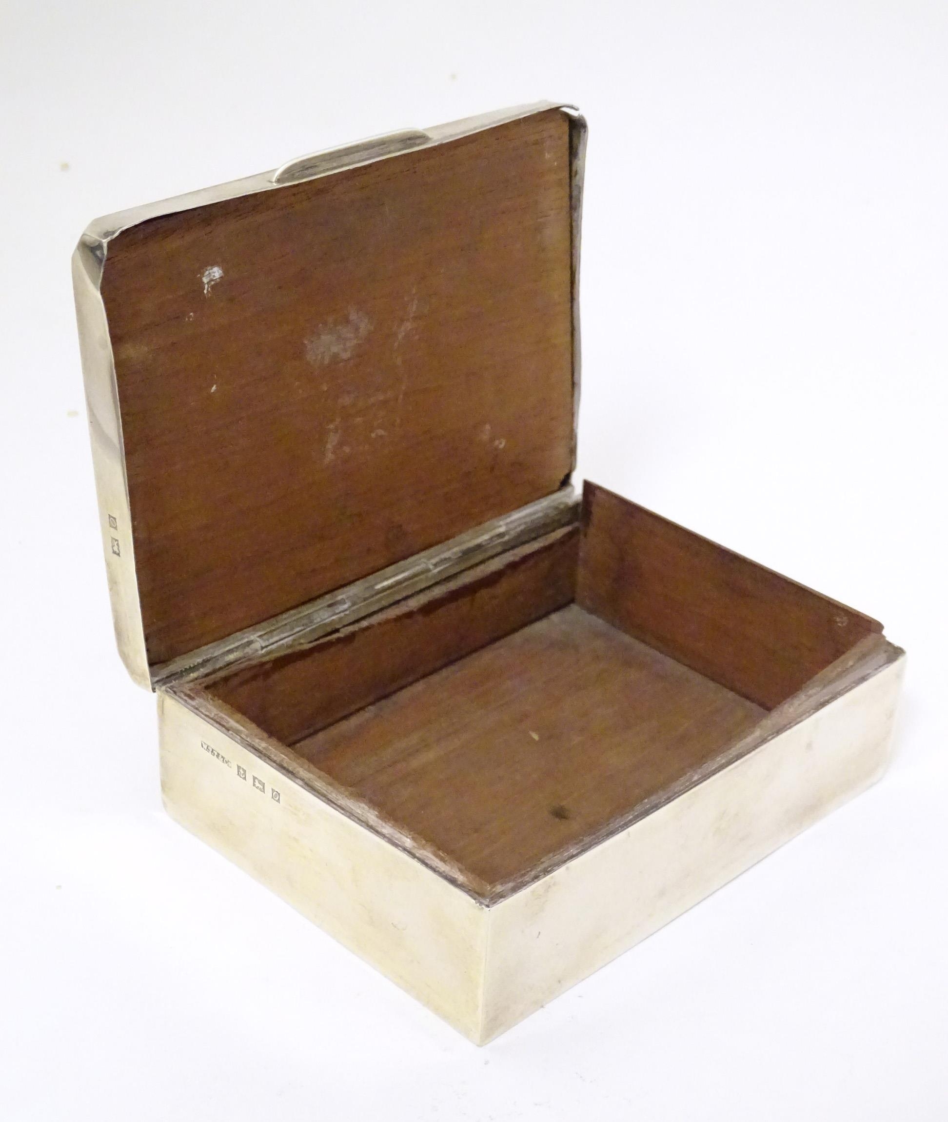 A silver cigarette box with wooden lining. Hallmarked Birmingham 1963 maker W T Toghill & Co. - Image 8 of 8