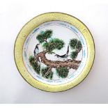A Chinese / Cantonese famille jeune dish with enamel detail depicting two birds on a branch. Approx.
