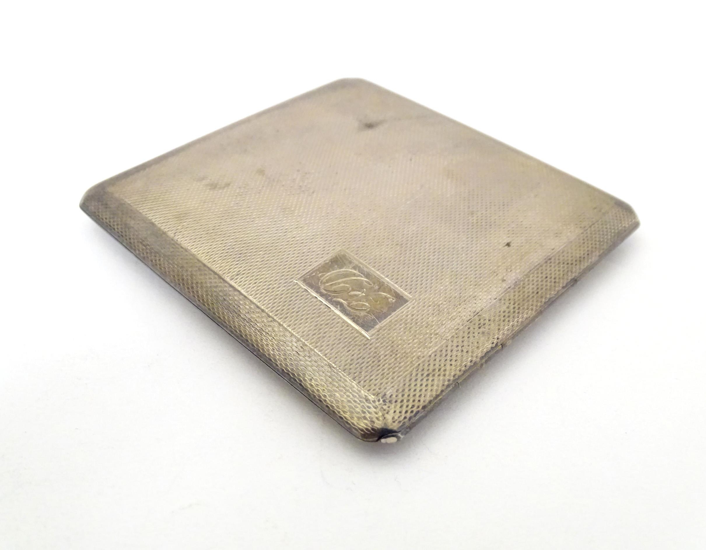 A silver cigarette case with engine turned decoration and gilded interior, hallmarked Birmingham - Image 4 of 10