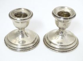 Two American short silver candlesticks, marked P. S. Co. Possibly Preisner Silver Company. Approx. 2