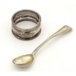 A silver napkin ring hallmarked Birmingham 1900, maker Henry Hobson & Sons. Together with a Geo