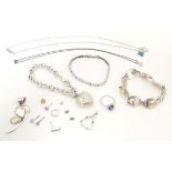 A quantity of assorted silver and white metal jewellery to include bracelets, pendant, ring, etc.