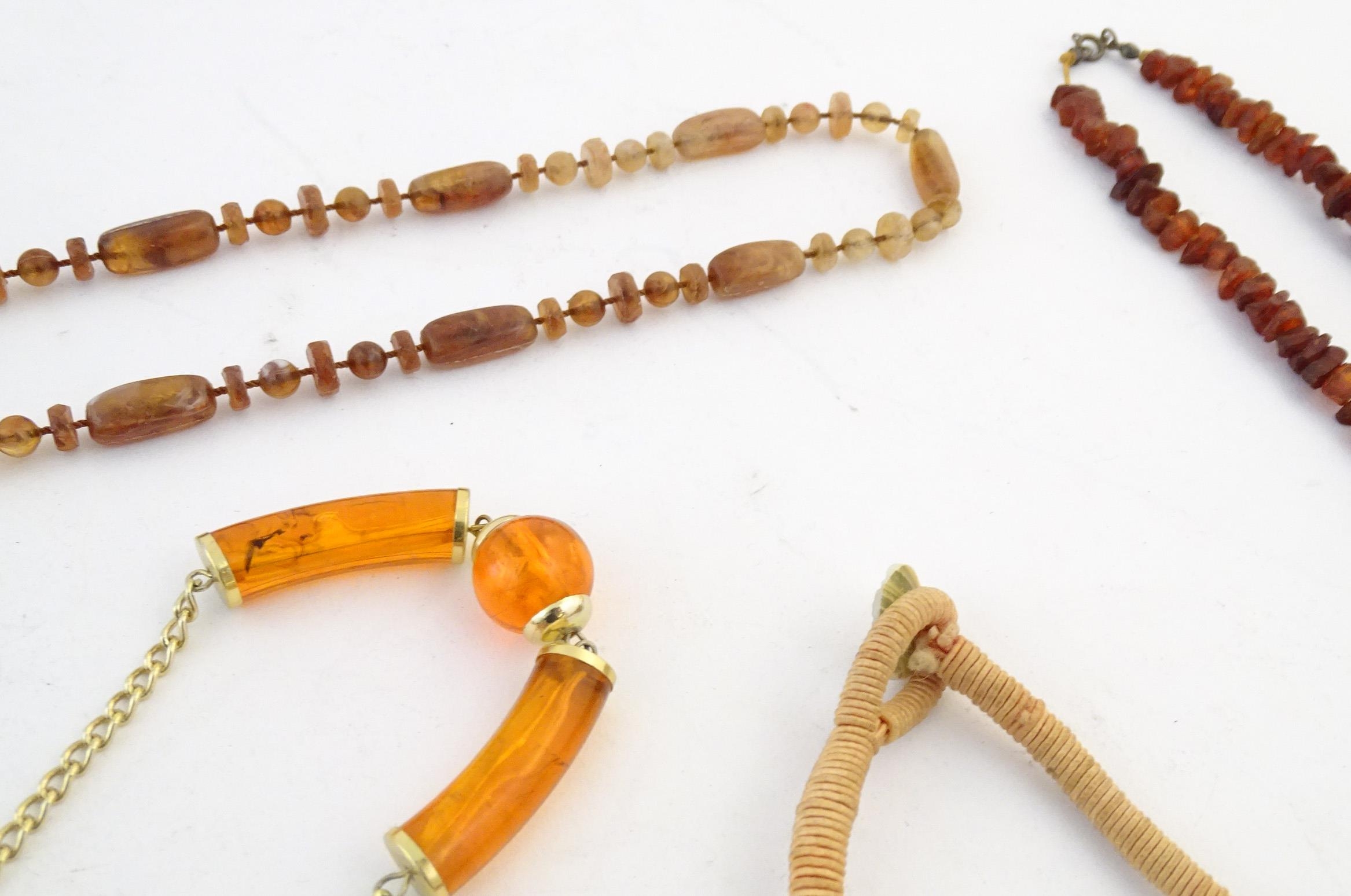 A quantity of assorted bead necklaces to include some amber examples. Please Note - we do not make - Bild 8 aus 16