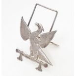 A Victorian silver menu holder with heraldic phoenix decoration hallmarked London 1883, maker Thomas