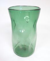 A large retro green glass vase with dimple detail. 12 1/2" high x 8" diameter Please Note - we do