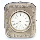 A pocket watch travelling case / night stand with easel back and silver surround, hallmarked