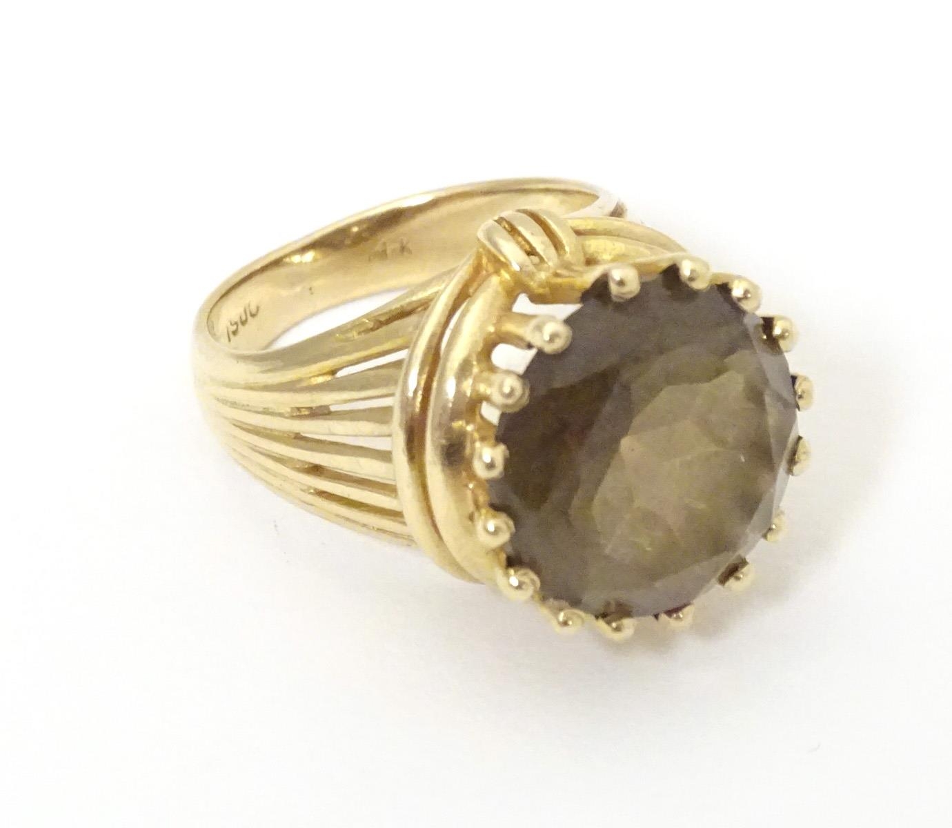 A 14ct gold dress ring set with citrine. Ring size approx K 1/2" Please Note - we do not make - Image 2 of 6