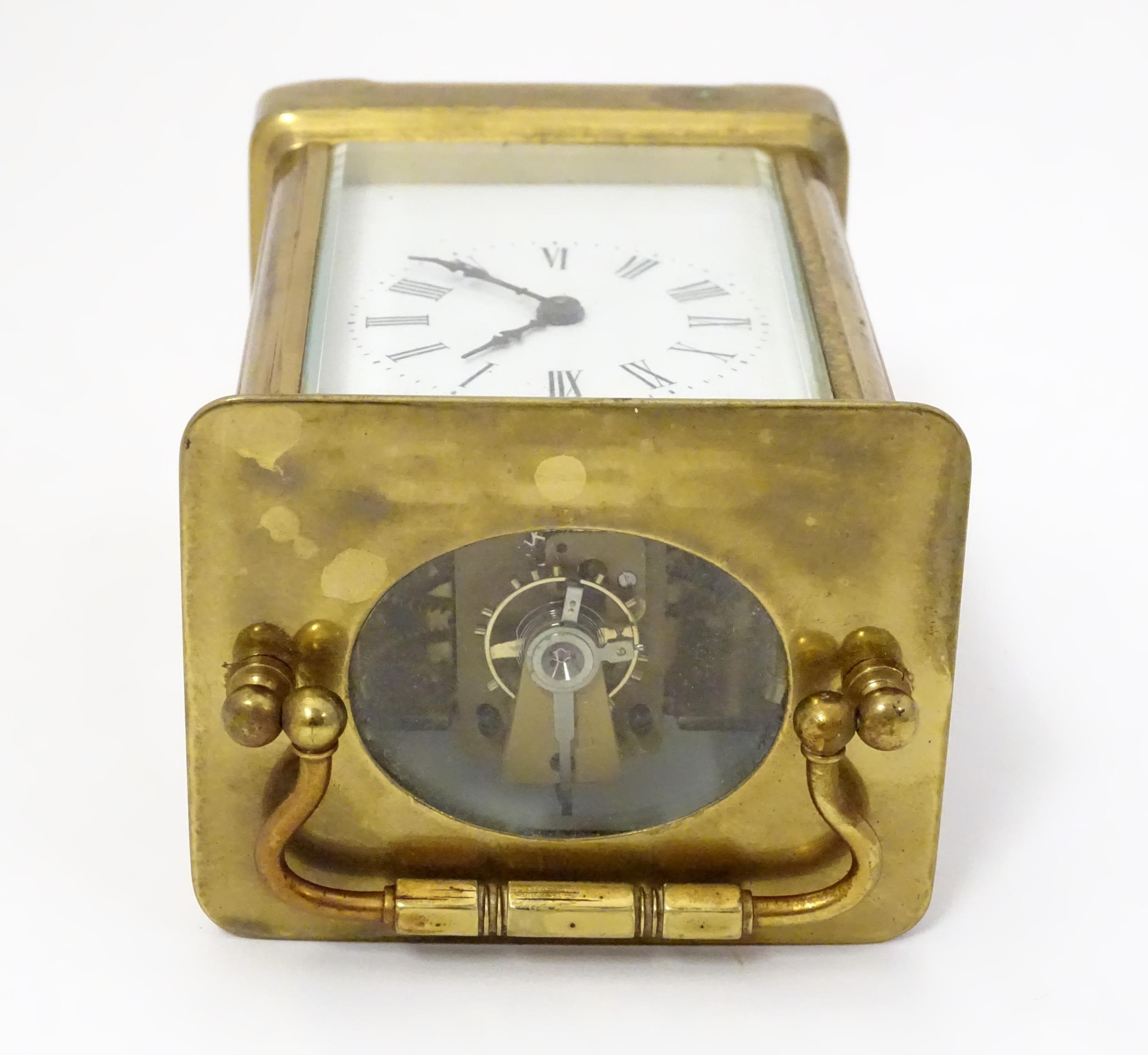 A carriage clock with brass case and enamel dial. Approx. 5 1/2" high overall. Please Note - we do - Image 12 of 13