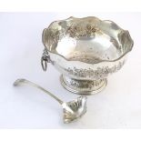 A large silver plate punch bowl and ladle. The punch bowl approx. 12 1/2" diameter x 8" high