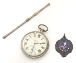 A Festival of Britain 1951 fob with enamel decoration. Together with a pocket watch, the dial signed