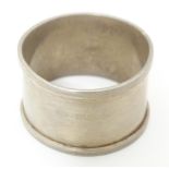 A silver napkin ring, hallmarked Birmingham 1924, maker Israel Sigmund Greenberg. Please Note - we