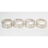 Four silver napkin rings, hallmarked Birmingham 2000, maker possibly Links of London (4) Please Note