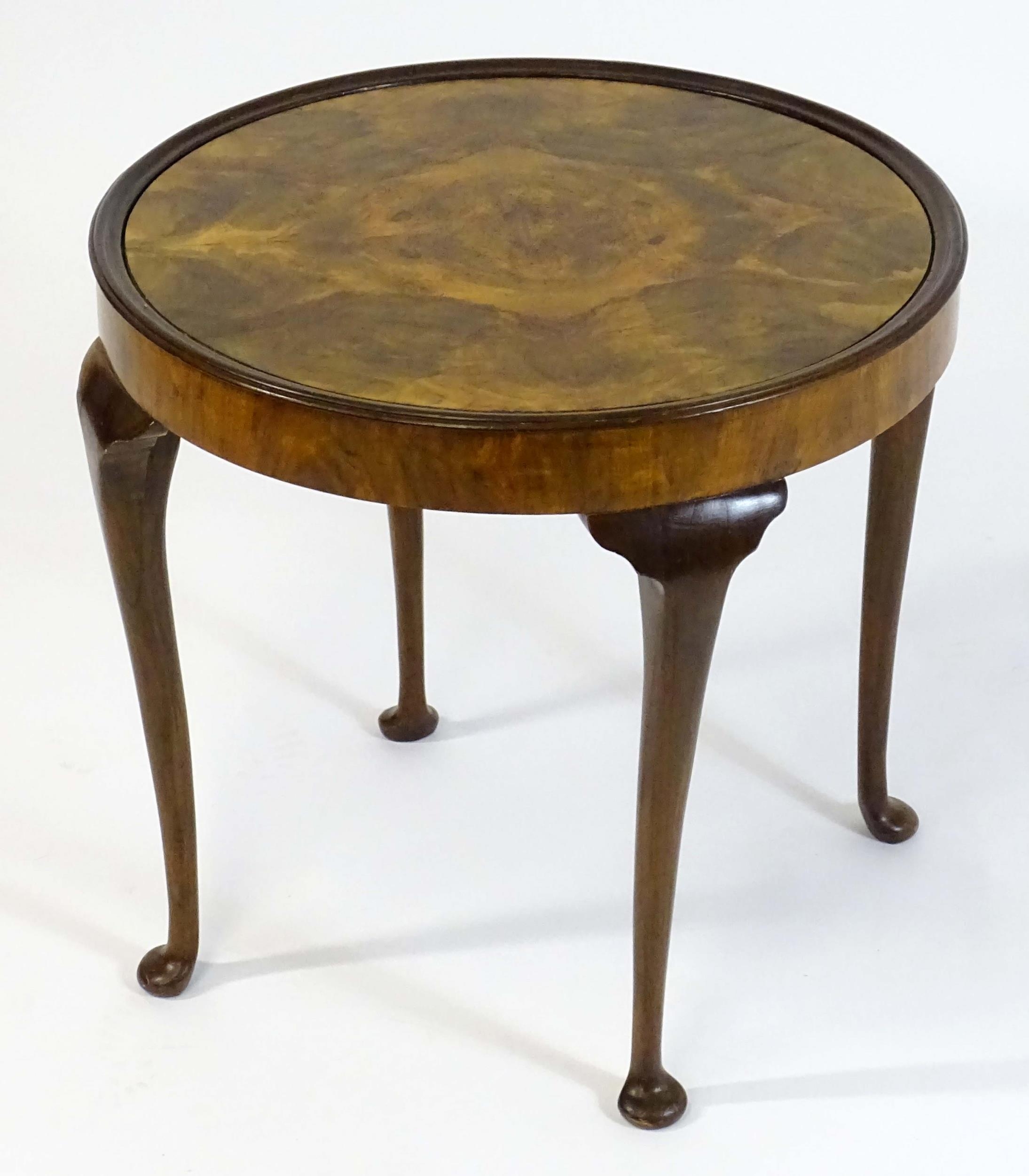 An early / mid 20thC walnut occasional / games table with a reversible top above four cabriole - Image 5 of 8