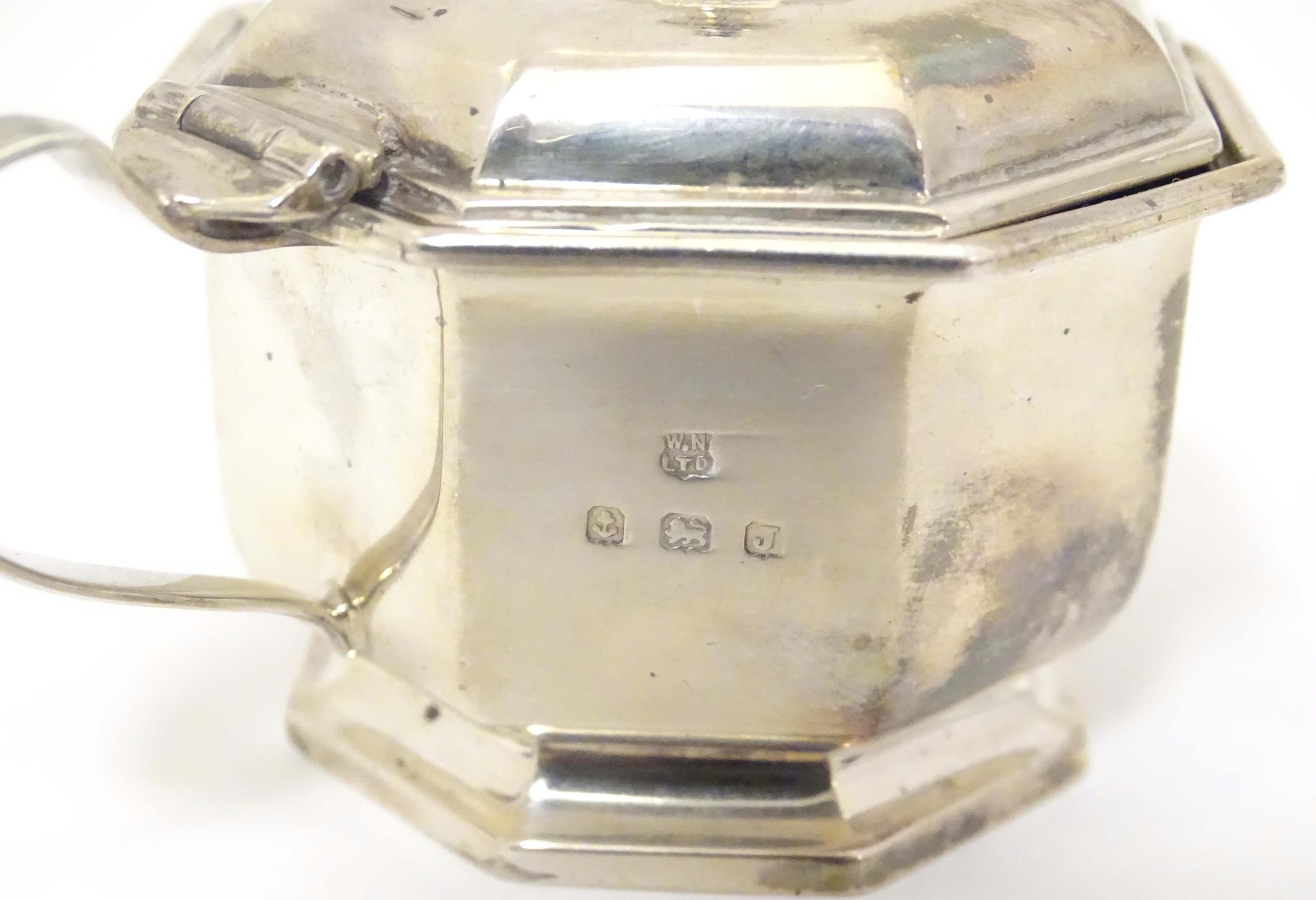 A silver mustard pot of octagonal form with blue glass liner. Hallmarked Birmingham 1933, maker - Image 5 of 7