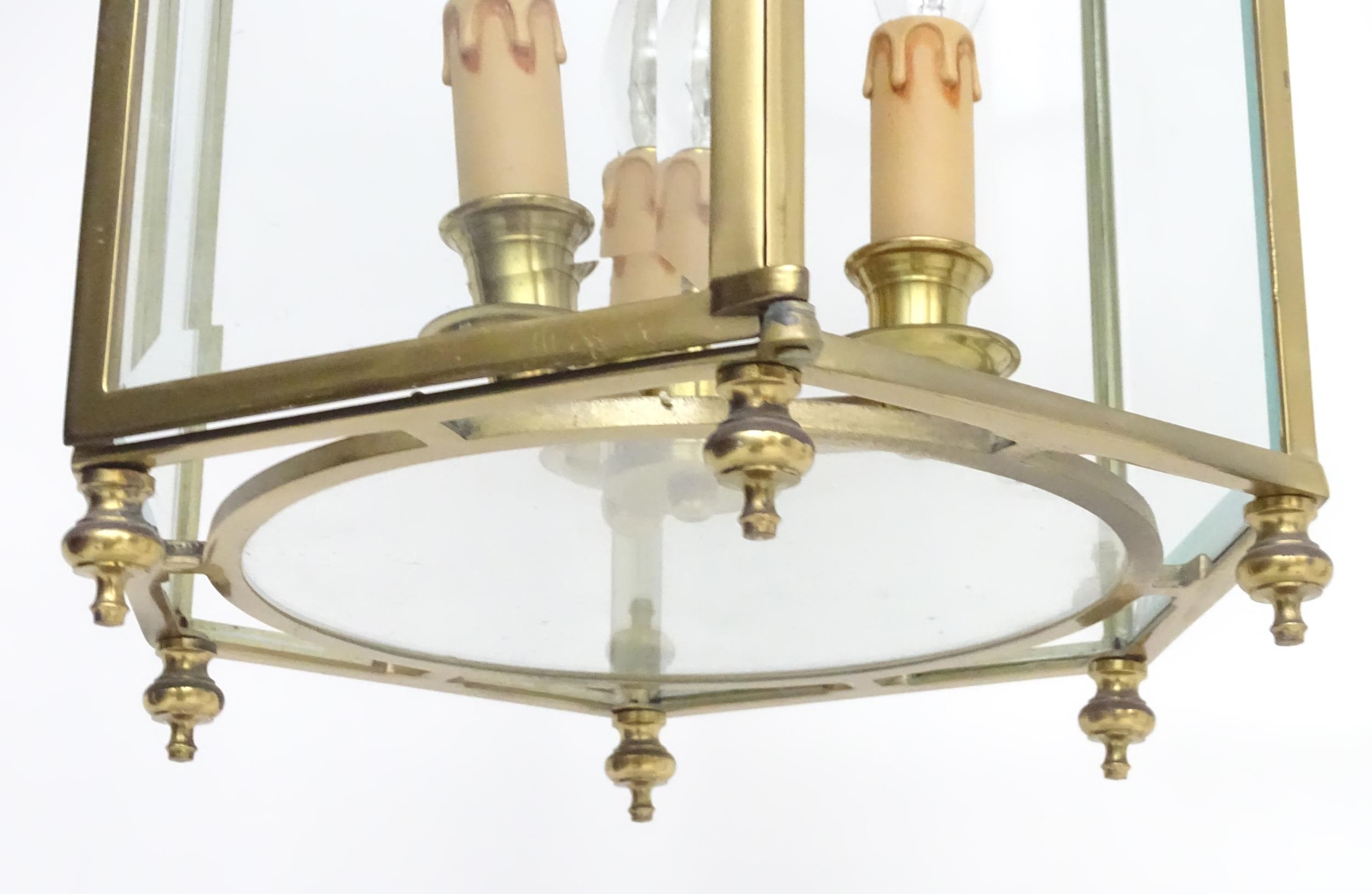 A 20thC pendant lantern ceiling light, the brass octagonal frame with bevelled glass panes, the - Image 2 of 7