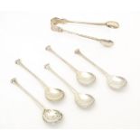 5 silver teas spoons together with matching sugar tongs. Hallmarked London 1914 maker Ernest