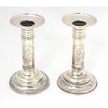A pair of American silver candlesticks, maker Meriden Britannia & Co. Approx. 5 3/4" high (2) Please