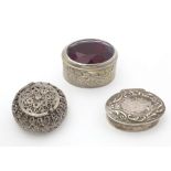 Three various pill boxes, to include one silver example, a silver plate example and a Continental