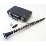 Musical Instrument: an Evette by Buffet, Paris clarinet, with spare mouthpiece, in fitted ABS