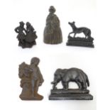 A quantity of assorted cast fireplace / fireside / chimney ornaments / door stops / porters to