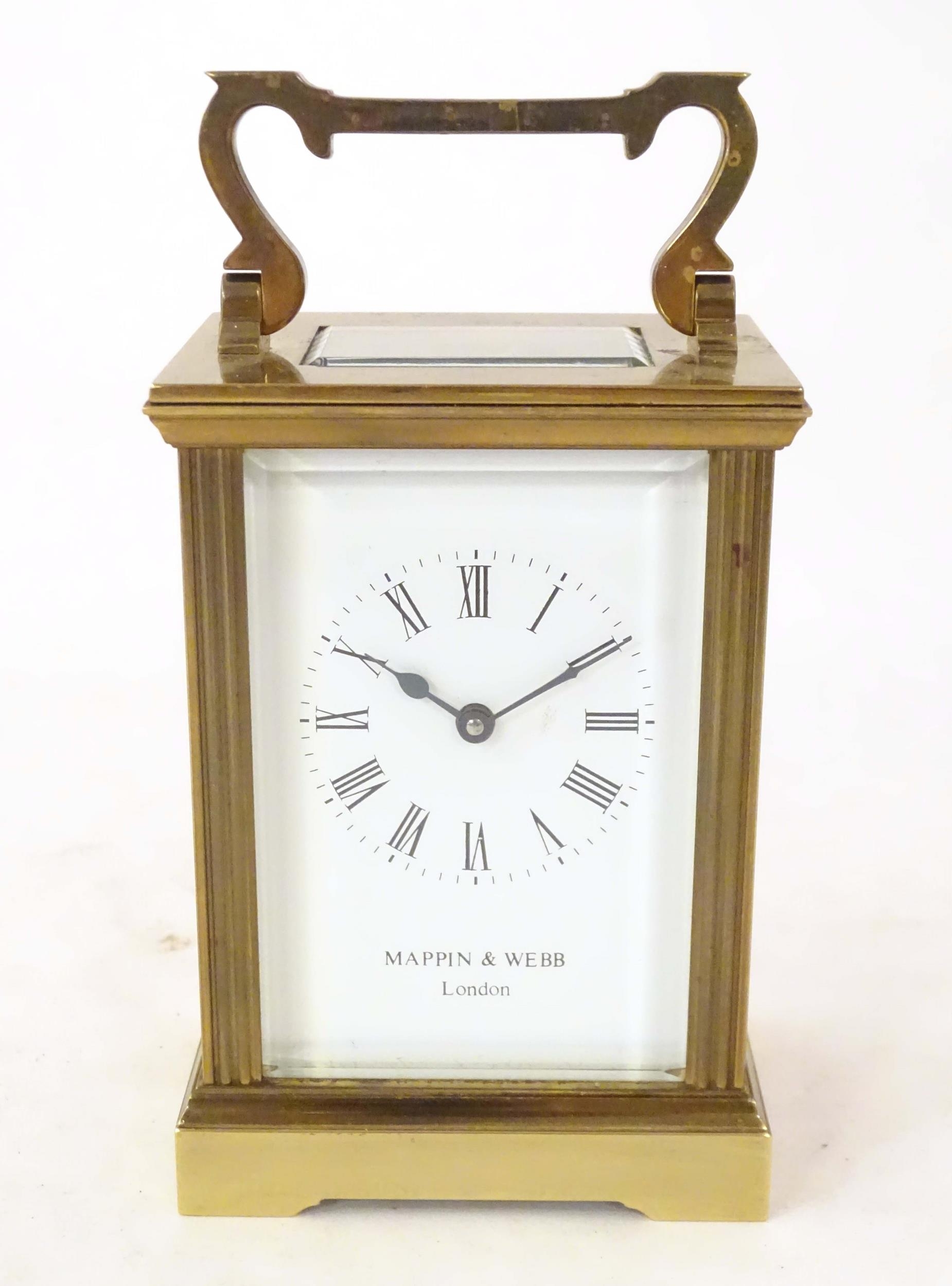 A carriage clock, the dial signed Mappin & Webb London'. 6" high overall Please Note - we do not