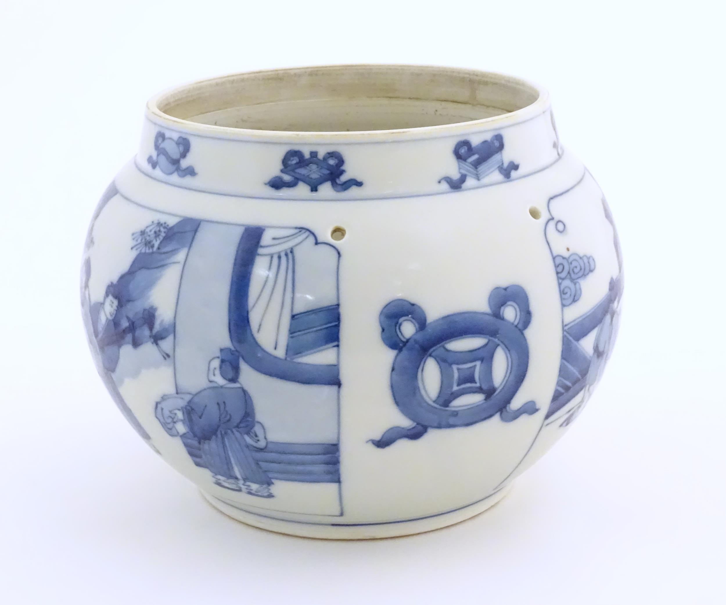 A Chinese blue and white planter with four drilled hanging holes, decorated with panelled decoration - Image 4 of 6