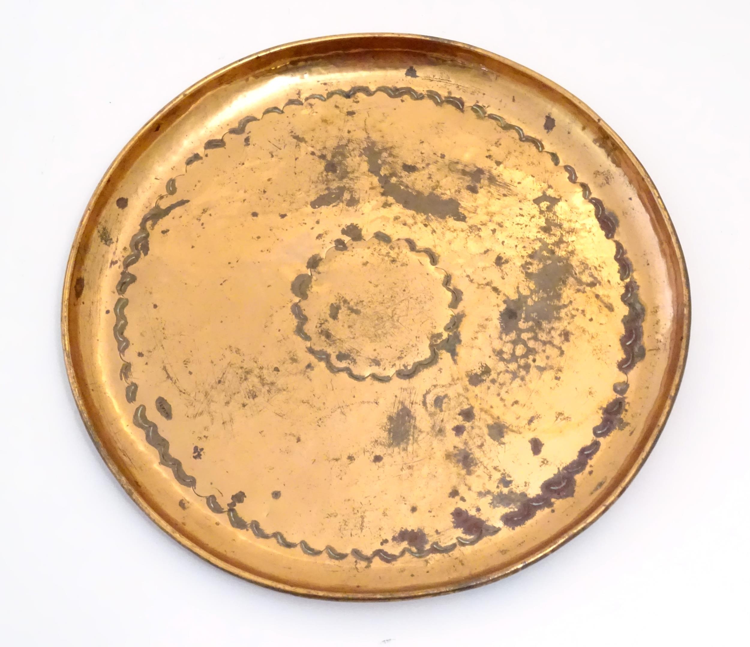 An Arts & Crafts Newlyn School copper dish / charger of circular form with lobed banded - Image 3 of 9