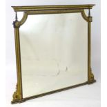 A Regency period over mantle mirror having a moulded cornice above gilt and gesso egg and dart