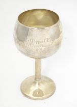 A silver trophy cup of goblet form with gilded interior, hallmarked Birmingham 1930, maker William