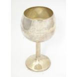 A silver trophy cup of goblet form with gilded interior, hallmarked Birmingham 1930, maker William