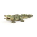 A cold painted bronze model of a crocodile / alligator. Approx. 2" long Please Note - we do not make