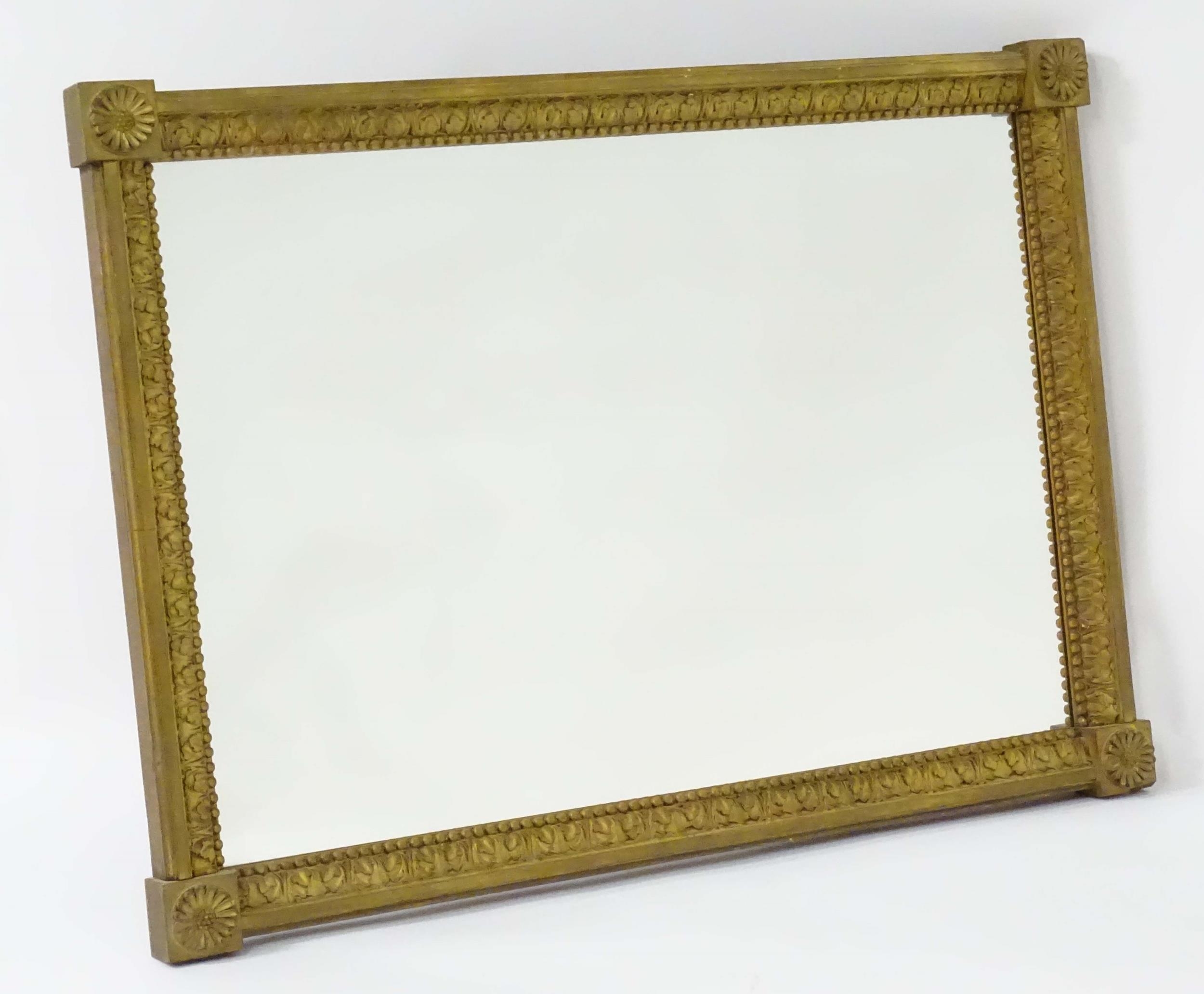 A late 18th / early 19thC mirror with a giltwood and gesso frame, having carved florets to the - Image 3 of 6