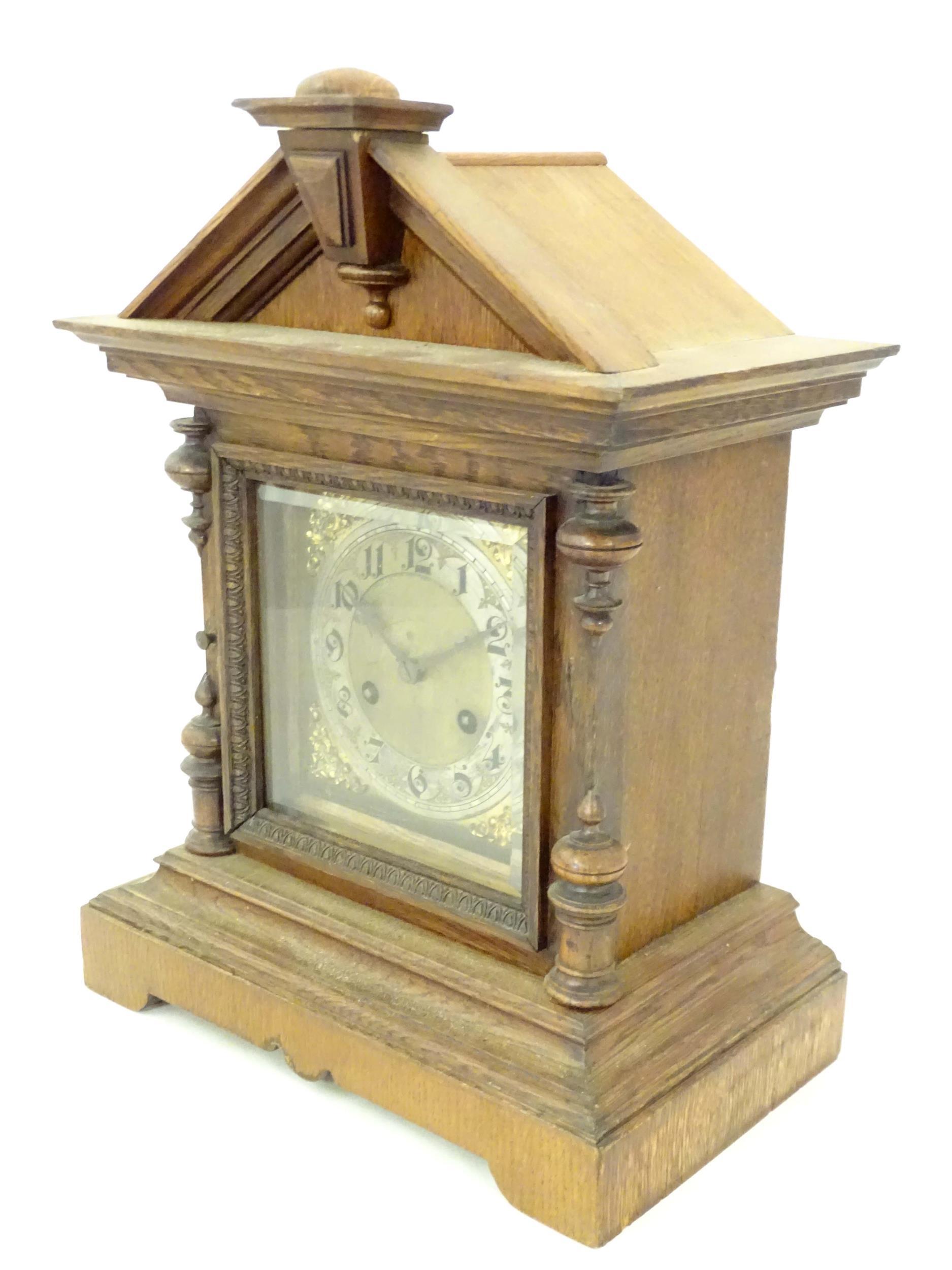 An oak cased Junghans mantel clock with silvered chapter ring having Arabic numerals and striking on - Image 3 of 9
