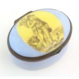 A 19thC Bilston / Battersea enamel patch box of oval form, the lid decorated with a huntsman and his
