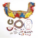 A quantity of Africa / Maasai beaded jewellery to include necklaces, bracelets, etc. Please Note -