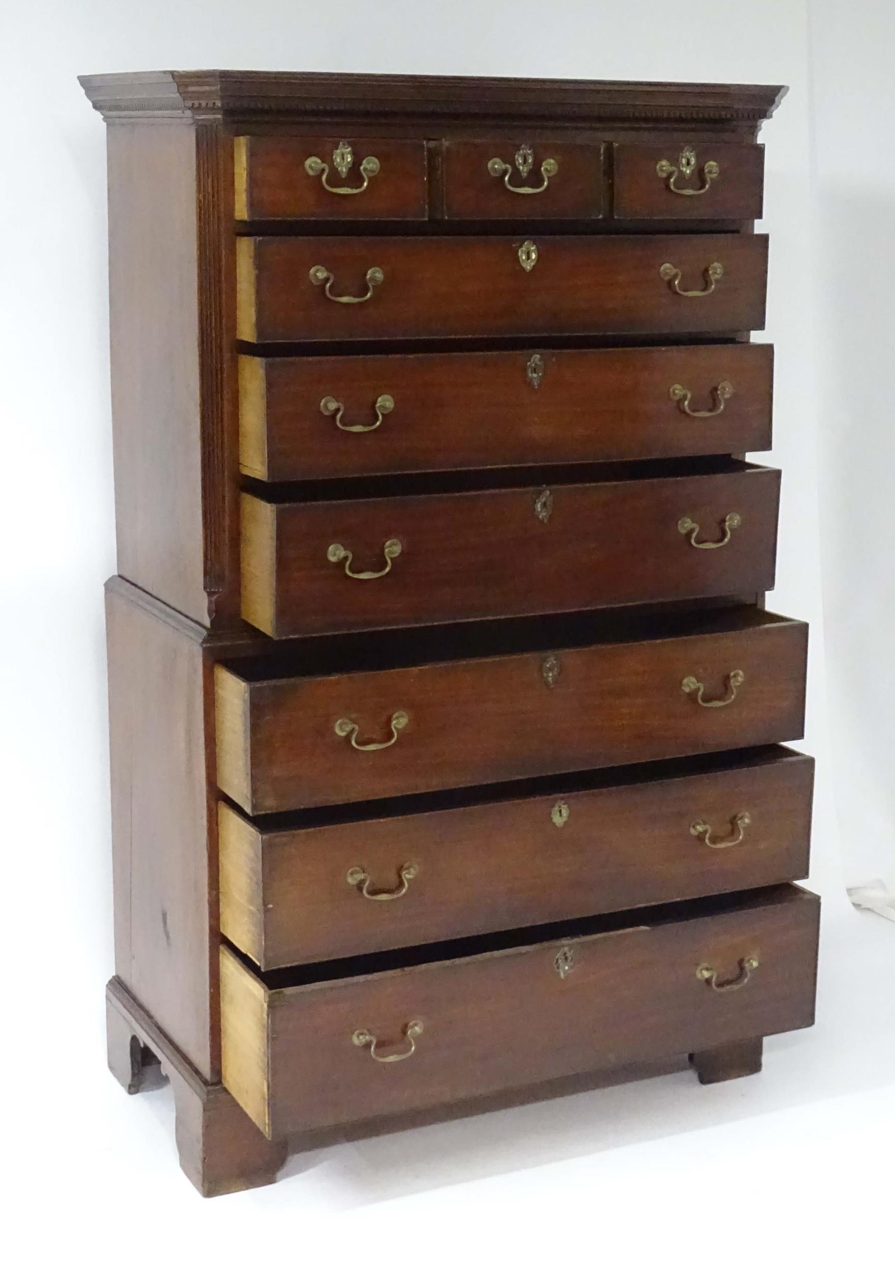 A mid / late 18thC mahogany chest on chest with moulded cornice above a dentil carved frieze, having - Image 13 of 14