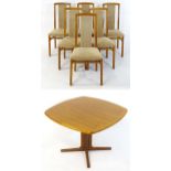 A set of six retro teak dining chairs accompanied by a retro teak table made by Laurits.M.Larson,