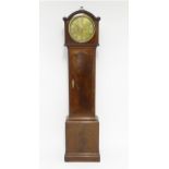 A 19thC mahogany longcase clock, the 8-day movement with circular silvered brass dial. Approx. 79"