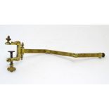 A late 19th / early 20thC cast and gilt fire screen bracket with clamp to one end. Approx. 10"