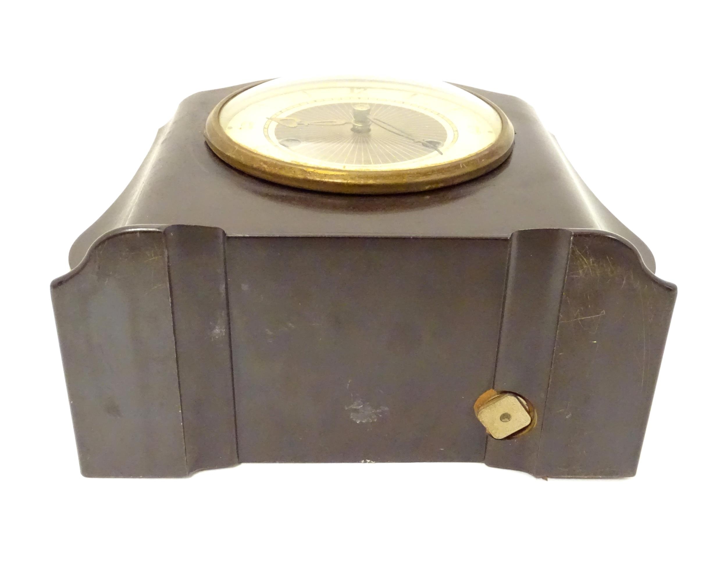 A Bakelite cased mantel clock by Smiths. 7 1/4" high Please Note - we do not make reference to the - Image 2 of 13
