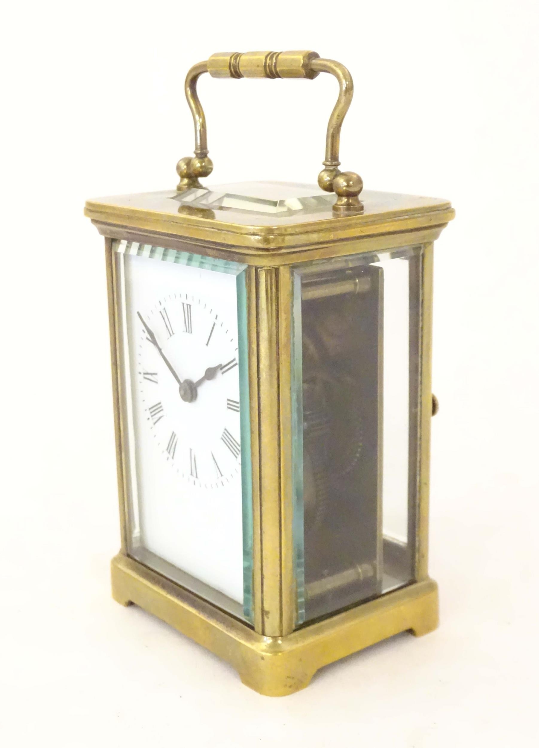 A brass carriage clock with white enamel dial. the whole 5 1/2" high Please Note - we do not make - Image 3 of 13