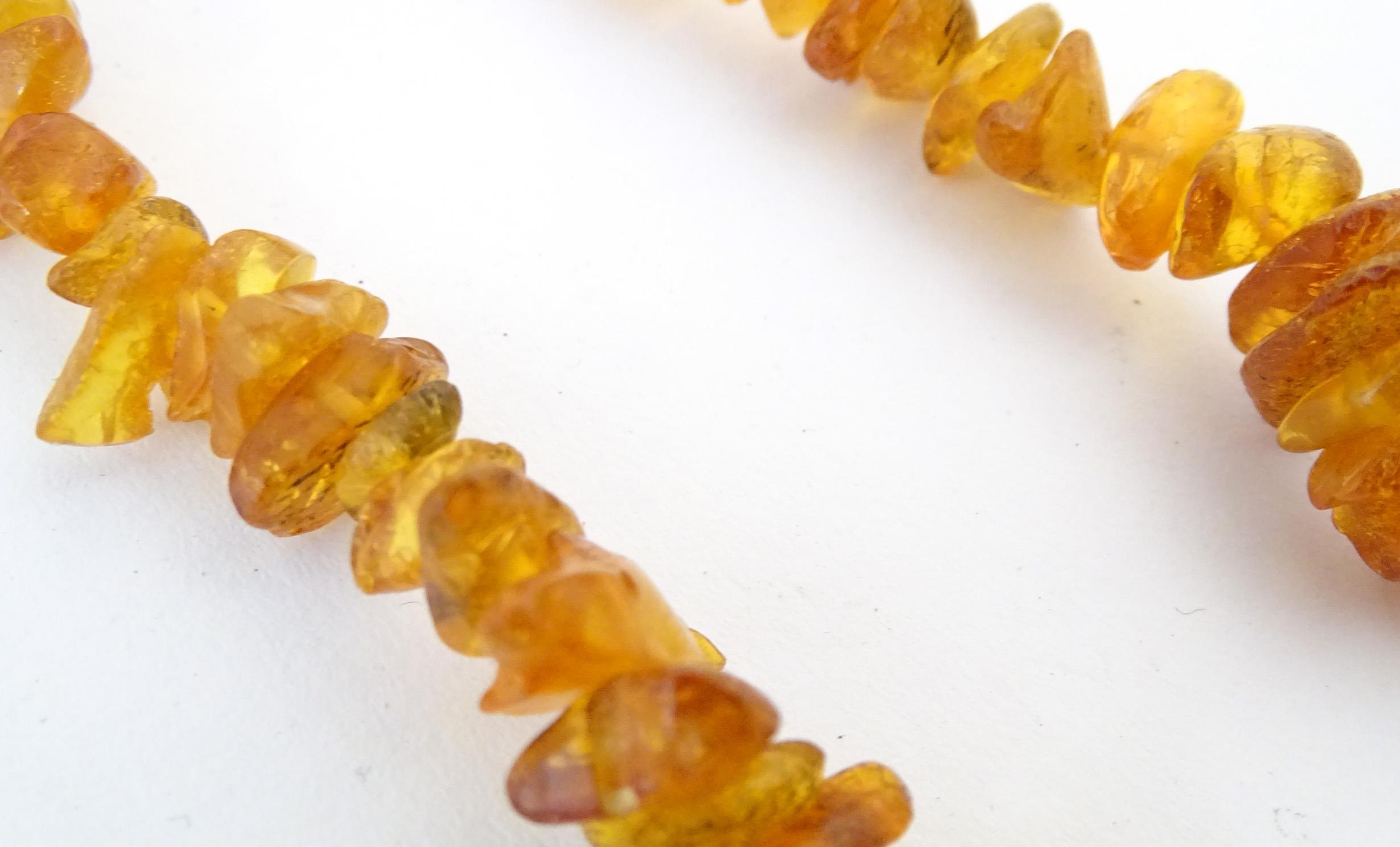 A quantity of assorted bead necklaces to include some amber examples. Please Note - we do not make - Bild 10 aus 16
